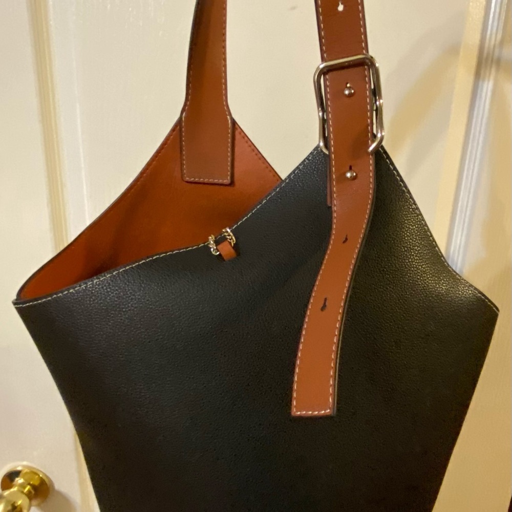 Great purse, lots of room. Love but got a new one.